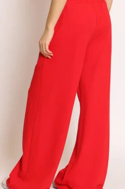 Pantalone felpa patch Snoopy rosso